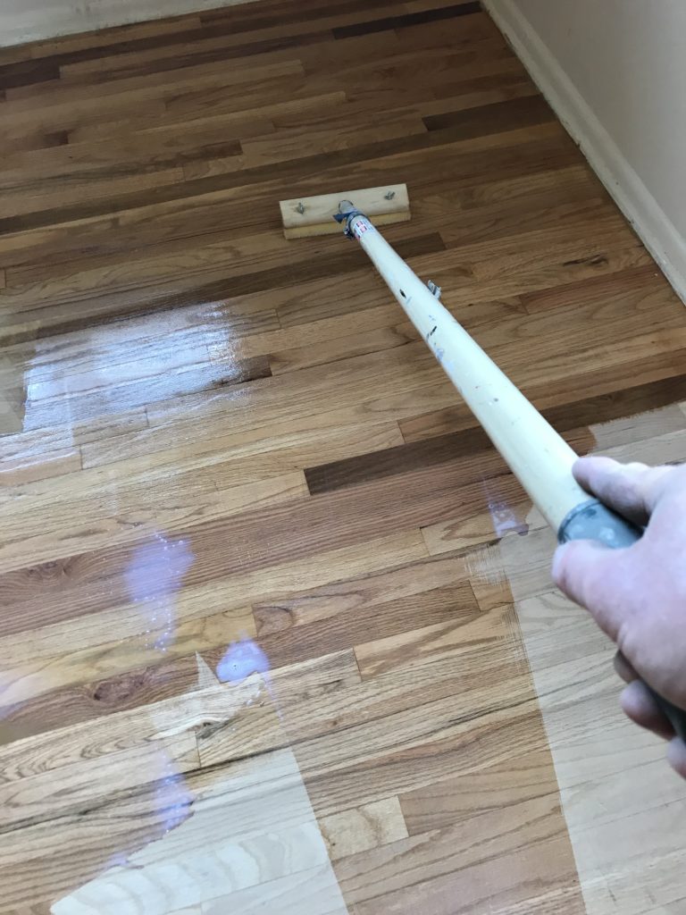 applying sealer to white oak hardwood