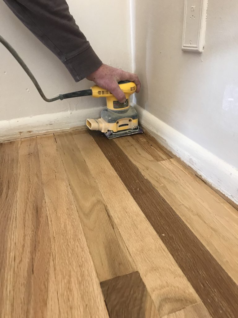 sanding wood floors to prepare